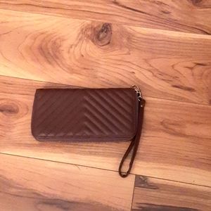 Brown Wallet.      SMOKE FREE HOME